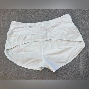 Lululemon Speed Up Shorts- Size 4 light blue. Some marks, but still in GC
